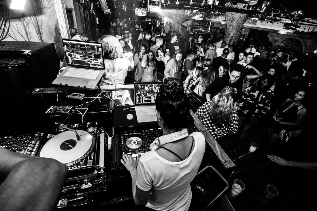 The crowd from the booth, black and white