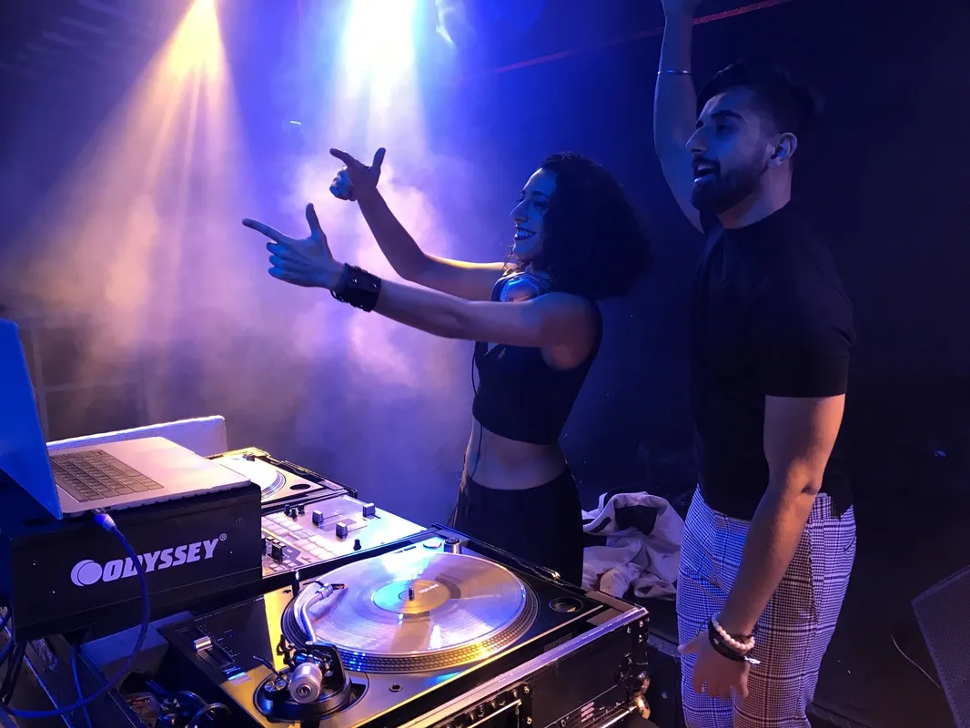 On the turntables under blue light