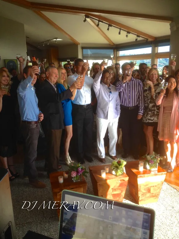 Guests raising a toast at a private party