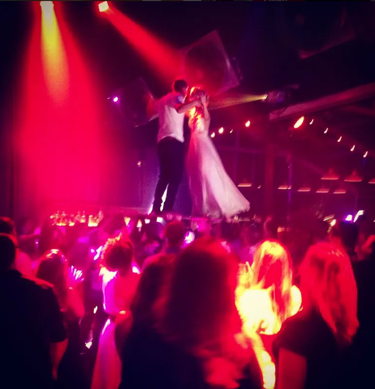 Reception dance under the red lights