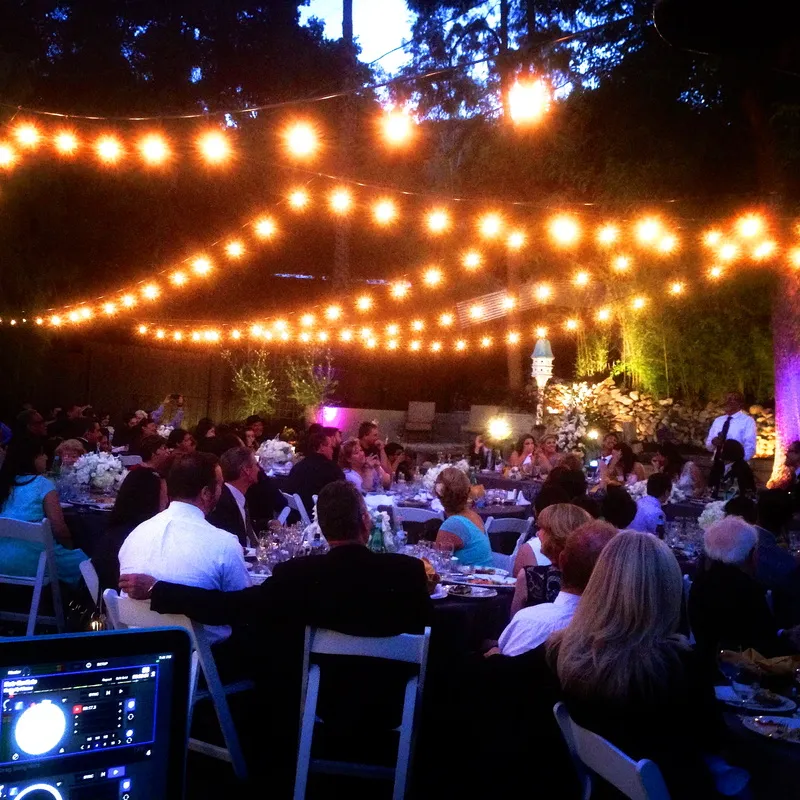 Outdoor reception under string lights